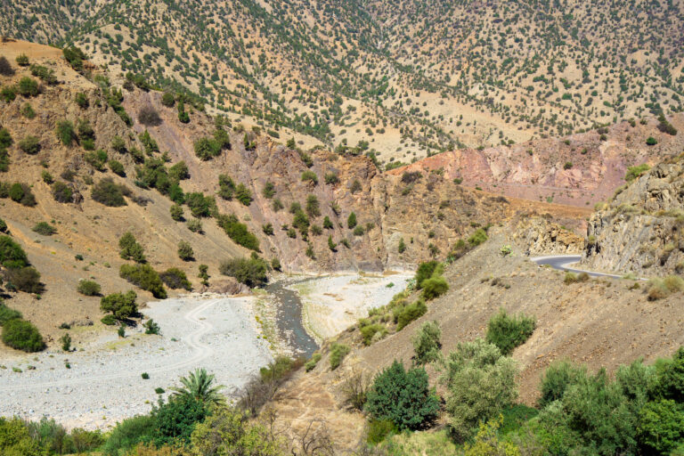 Winding road through a rugged desert landscape