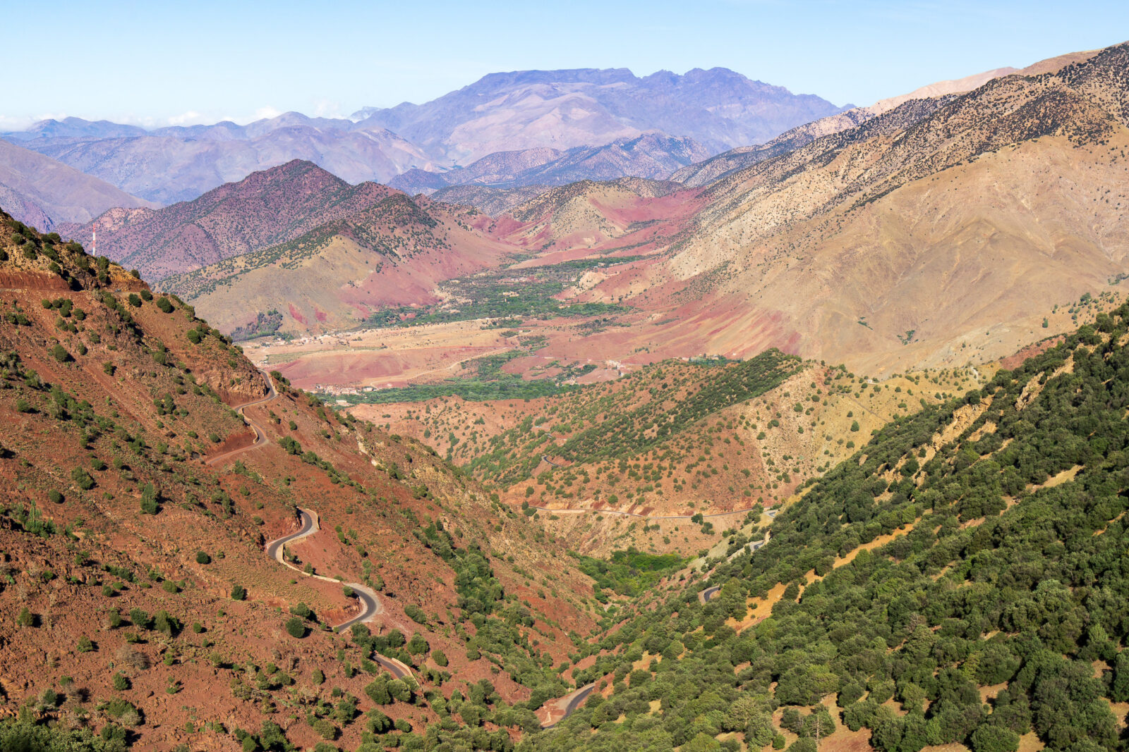 Winding mountain road through colorful Atlas landscape