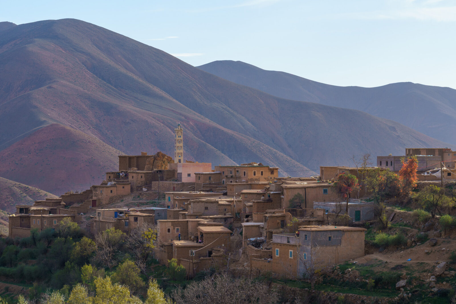 Ancient village nestled in the vast mountain landscape