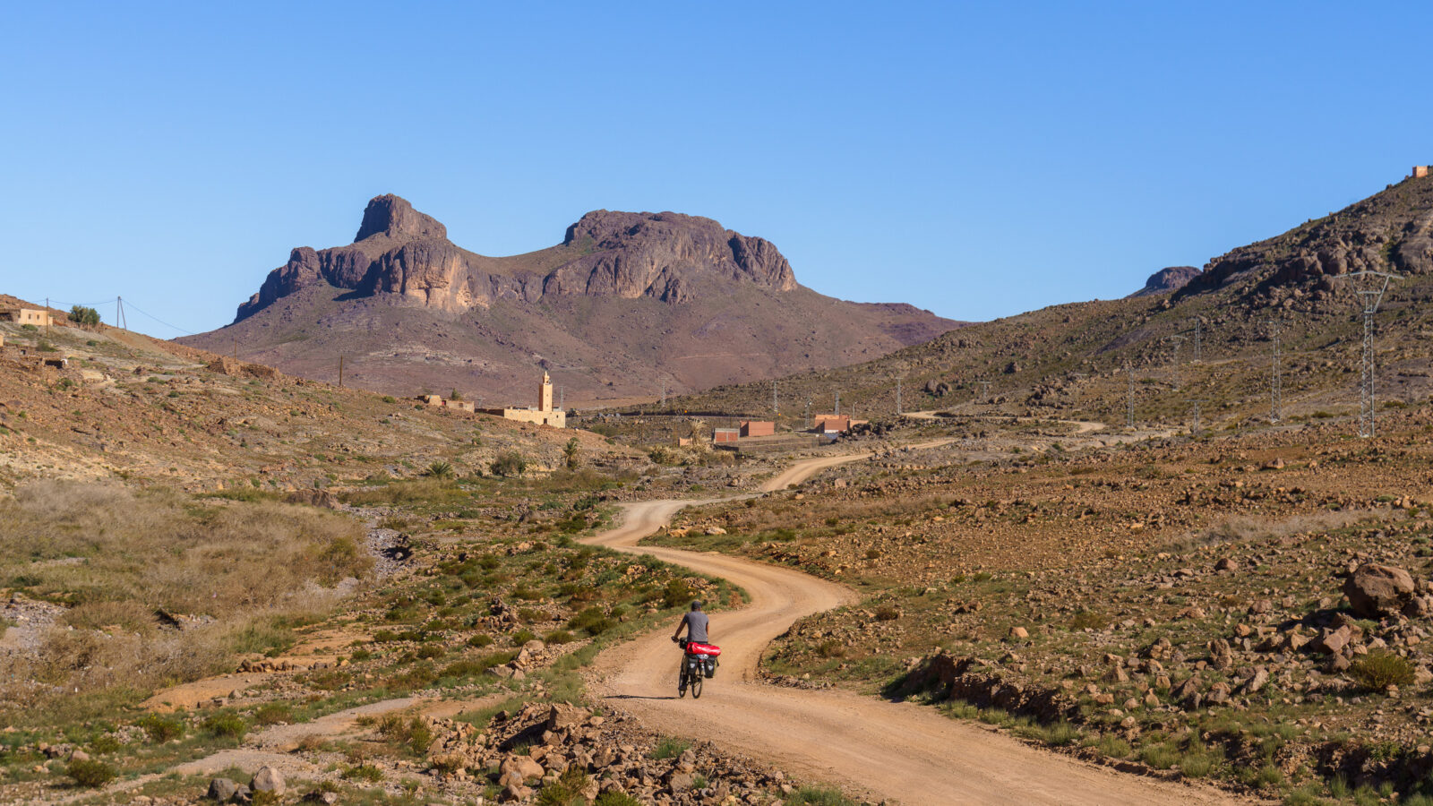 Cycling through a remote mountain landscape