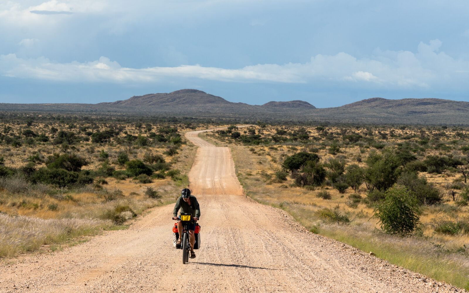 Solitary journey on a winding desert road