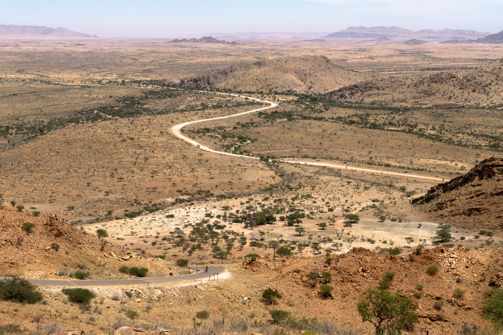Winding desert road to the horizon